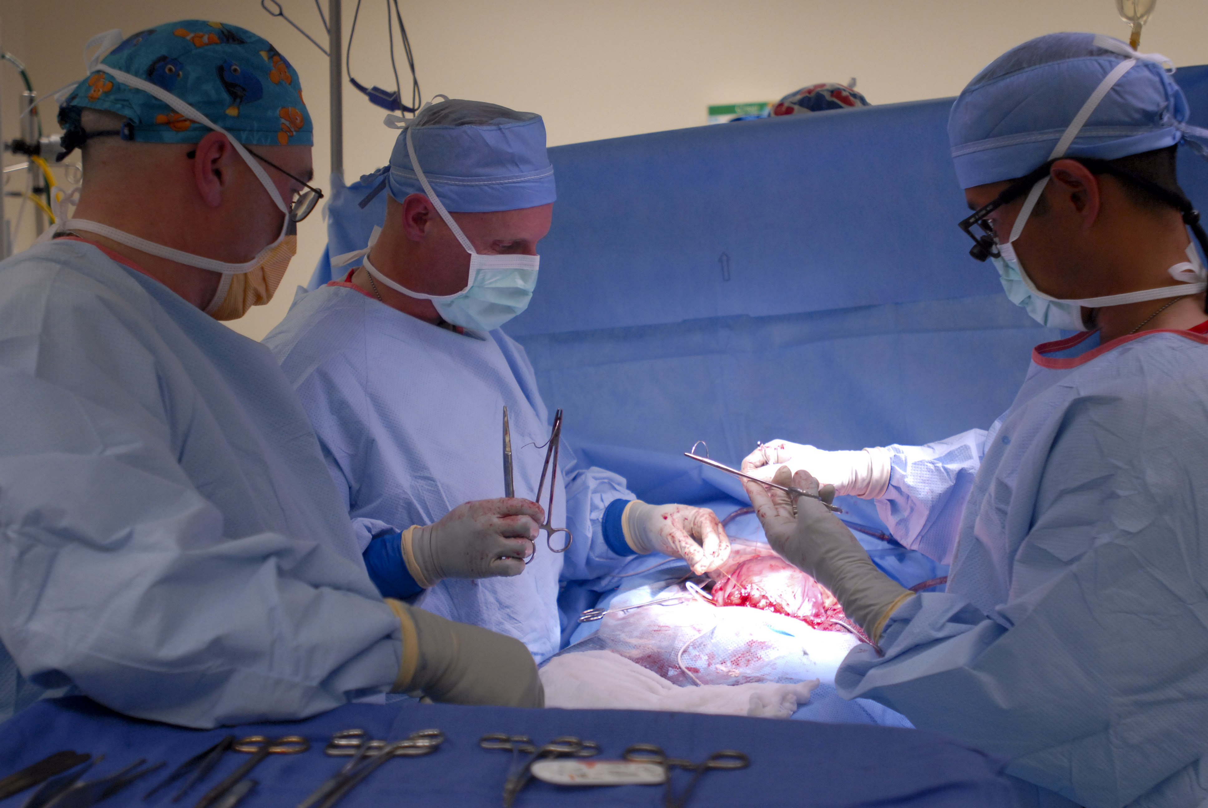 Doctors deliver via c section