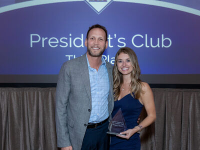 President's Club with two Eloquest staff members